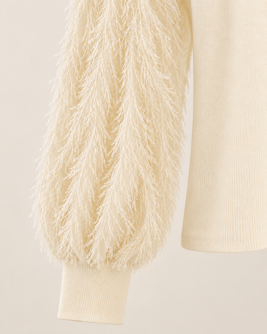 Feather Sleeve Knit Top – sleeve cuff detail