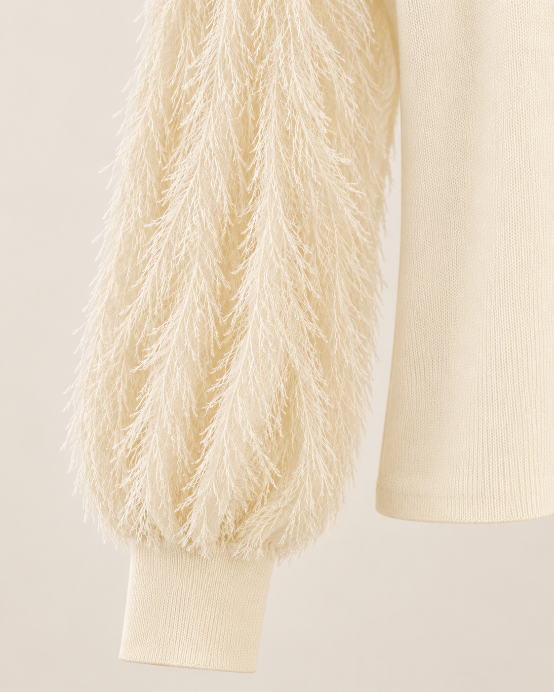Feather Sleeve Knit Top – sleeve cuff detail