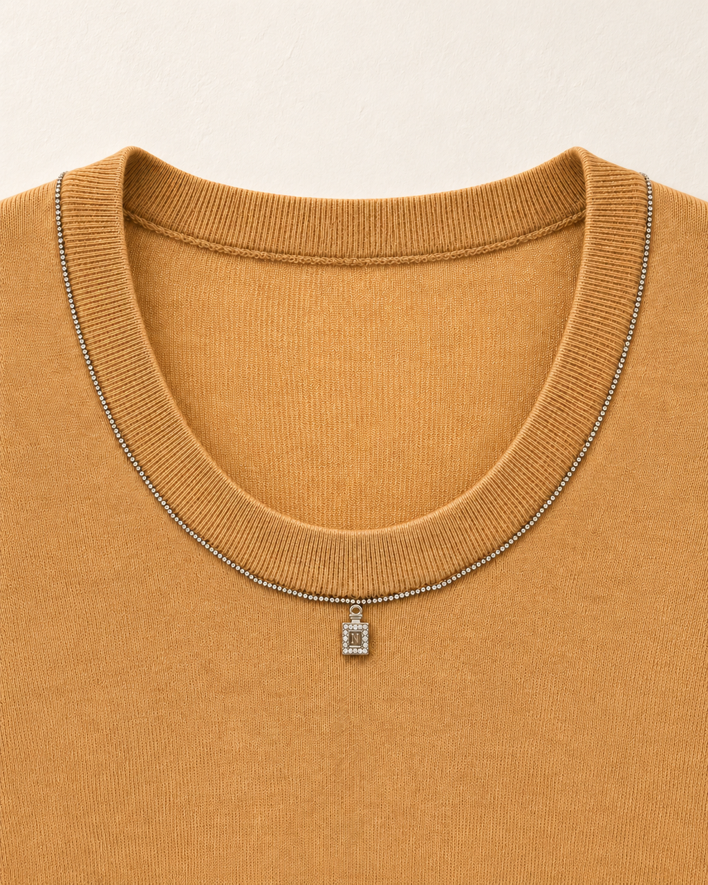 Pendant Knit Top – pendant neckline detail